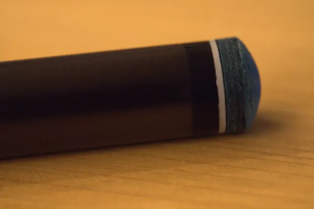 Gen 5 Pro shaft joint and tip detail on a wood surface.